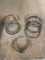 All bangles grouped by colour tone on work surface