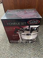 Retail box showing ExcelSteel 11-piece stainless fondue set