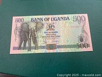 Obverse of 1994 Uganda 500-shilling note with elephant, serial DX768717