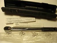 Torque wrench with case, plastic bag and paperwork