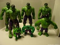 Front view of all seven Hulk figures