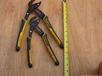 Both Stanley FatMax groove-joint pliers beside tape measure