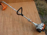 Full view of Stihl FS 38 trimmer showing shaft and guard
