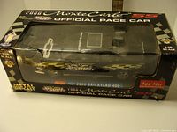 Full view of retail window box showing branding and model inside