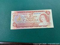 Front of 1974 Canadian $2 banknote showing portrait, serial number and denomination