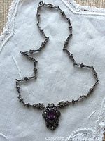 Full view of 16-inch .935 silver link necklace with pendant