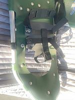 Snowshoe binding area showing aluminum frame, rivets, straps