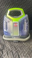 Front view of Bissell Little Green ProHeat spot cleaner