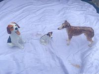 Group shot of all three Royal Doulton dog figurines