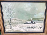Full view of framed winter landscape painting