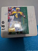 Box with sample Green Bay Packers SkyBox card on top