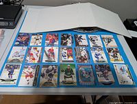 All 21 cards laid out in three rows on blue background
