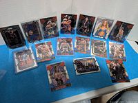 Panini Chronicles WWE XR cards and screw-down held cards displayed on table
