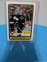 Front of Topps Wayne Gretzky #120 card in holder
