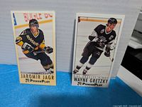 Fronts of Jaromir Jagr and Wayne Gretzky cards