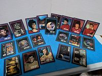 Front display of 21 Star Trek 25th Anniversary cards showing character portraits and episode scenes