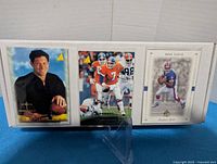 Three sample trading cards displayed in a row