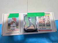 Box with three sample cards: Sandy Alcantara Award Winner, Bo Bichette, Orel Hershiser