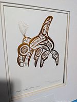 Front view of framed Bill Reid print showing artwork, mat and frame