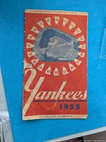Front cover of 1955 New York Yankees program showing design and condition