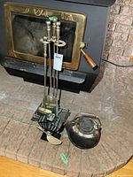 Full lot showing tool set, kettle, stove background