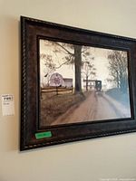 Full view of framed print on wall