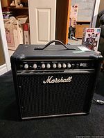Front view of Marshall MB Series B30 amplifier showing grille, logo and control panel