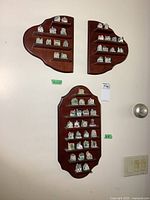 All three display racks mounted on wall with thimbles arranged