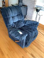 Front angled view showing upholstery, lever, overall form