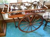 Full view of tea wagon with wheels and handle