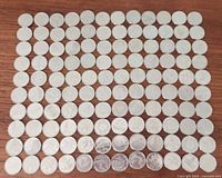 Full layout of 120 Canadian quarters in grid