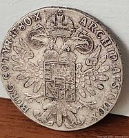 Obverse of Maria Theresa Thaler showing double-headed eagle and inscriptions