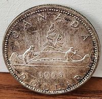 Voyageur reverse with CANADA, 1966, DOLLAR legends visible