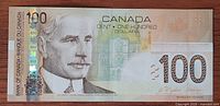 Front of 2004 Canadian $100 note showing portrait of Sir Robert Borden and holographic stripe