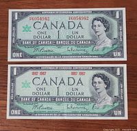 Both 1967 Canadian $1 bills side by side, full view