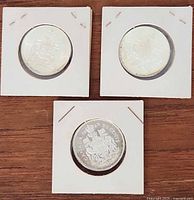Three 1963 Canadian half dollars in holders