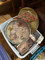Bin containing acrylic pitcher, tumblers, mesh food cover, placemats