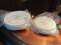 Top view of stacked Mikasa Gentle Breeze dinner and salad plates showing pattern and sizes