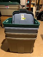 Stacked view of all four Rubbermaid Roughneck totes with lids