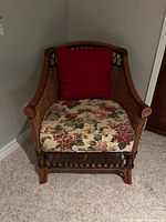 Front view of wicker armchair with cushions