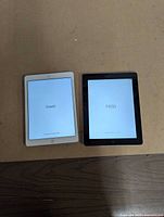 Front view of both powered-on iPads