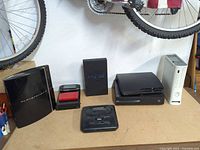 Group shot of all consoles and stand on tabletop