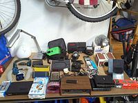 Overall view of entire table with mixed electronics