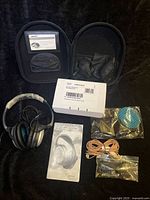 Entire lot: headphones, case, cushion kit box, manual, cable, adapter, blue insert