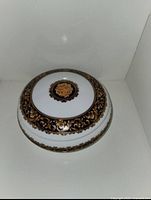 Top view showing gilt and navy decorative design