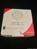Front of retail box showing Rogers Ignite WiFi Pod branding
