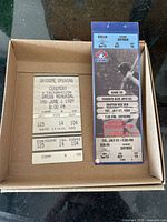 Front of both tickets in box