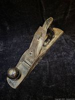 Oblique view of full plane showing knob, tote, body