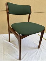 Full view of chair showing frame, seat and backrest