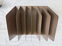 Top view showing seven dividers of beige metal file sorter